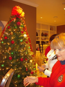 Anne and Charlotte, members of TN Fisher House Board, decorating the tree.