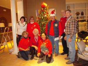 TN Fisher House Board Members Proudly in front of the tree.