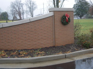 WELCOME WREATHS ON THE DRIVEWAY ENTRY