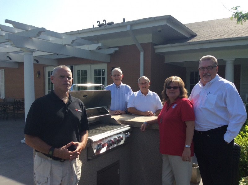 President of MOAA, Tom Hickerson,         Jan and Jim Edens with new grill