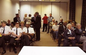 Attendees viewing the Fisher House DVD